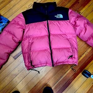 Pink and black XL women’s North Face puffer